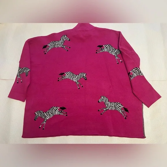 Shop The Mint Pink Zebra Print Sweater
Size Small - Picture 6 of 7